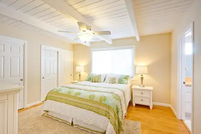 a bedroom with a bed and a ceiling fan at Beautiful Views - Sand Section of Manhattan Beach 2 Bed/2 Bath in Manhattan Beach