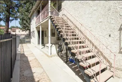 a set of stairs on the side of a building at Spring Charmer In The Heart Of The City in Los Angeles