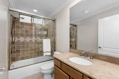 a bathroom with a sink and a toilet and a shower at Luxury 2-Bedroom Condo in Studio City in Los Angeles