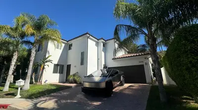 a boat parked in front of a house at LA Dream Gem - Beautiful Home with Spa in Los Angeles