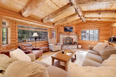 a living room filled with furniture and a fireplace at The Alps Lodge #2142 by Big Bear Vacations in Big Bear Lake