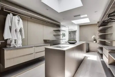 a large kitchen with a counter and a sink at Vista Modern in Los Angeles