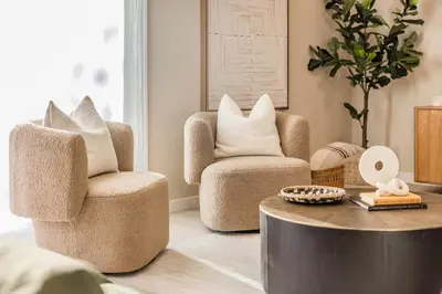 a living room with two chairs and a coffee table at @ Marbella Lane - Vibrant & Chic Designer Home in Fullerton