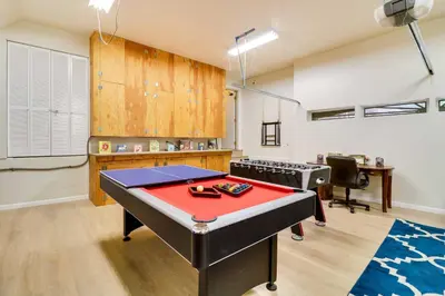 a ping pong table in a ping pong room at Spacious Pine Mountain Club Cabin with Fire Pit in Pine Mountain Club