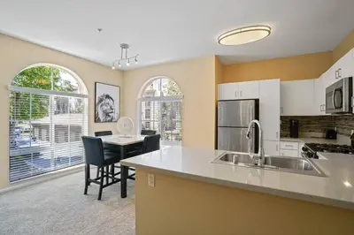 a kitchen with a sink and a counter top at Luxury 2BR/2BA!5Min to Disney! Angelstadium! HondaCenter. in Anaheim