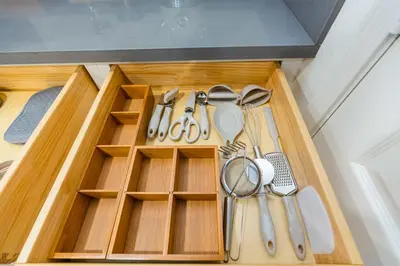 a drawer filled with utensils in a kitchen at Newly Remodeled 5B4B 2 mile from the Rose Parade in Pasadena
