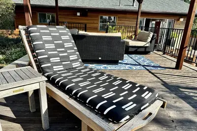 a bench sitting on top of a deck at Hollywood Hideaway in Los Angeles
