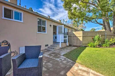 a house with a patio and a fence at 1 Mi to Dtwn Burbank Mod Gem with Private Yard in Burbank