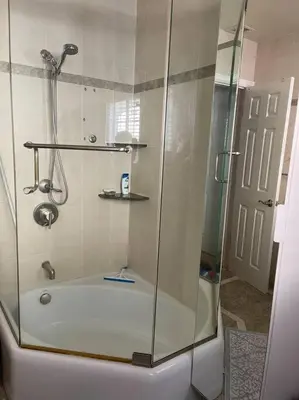 a shower with a glass door in a bathroom at Luxury Oasis Home w/Pool Near CSUN-6 Guests in North Hills