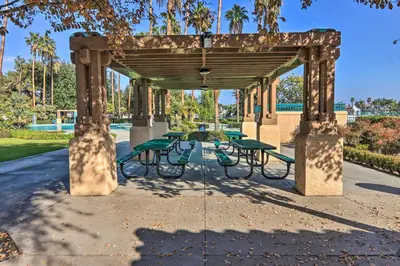 a group of picnic tables in a pavilion in a park at Family-Friendly Getaway Community Amenities! in Bakersfield