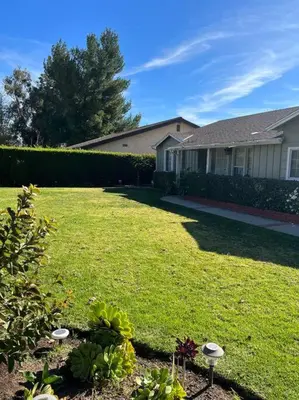 a yard of a house with a lawn sidx sidx sidx sidx at Vacation Rental w Pool &Garden 6 Guests near CSUN in North Hills