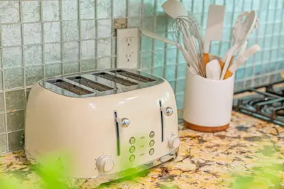 a toaster sitting on top of a kitchen counter at Single Level House with view and pool in Glendora
