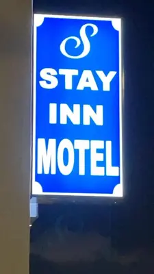 a sign that says stay im motel on a wall at Stay Inn Motel in Harbor City