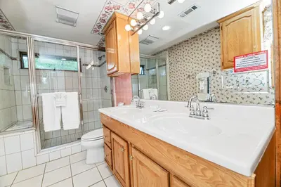 a bathroom with a sink and a toilet at Narrow Escape - Close to Lake and Slopes in Big Bear Lake