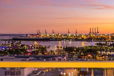 a view of a harbor at night with a cruise ship at @ Marbella Lane - Luxury Beachside 2BR in Long Beach