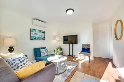a living room with a couch and a table at Quiet Carpinteria Cottage By Town and Beaches in Carpinteria