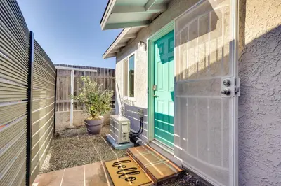 a door to a house with a green door at Quiet Carpinteria Cottage By Town and Beaches in Carpinteria