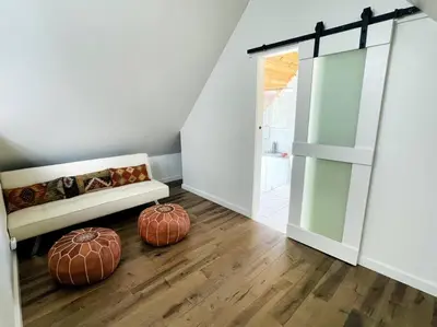 two large pumpkins sitting on the floor in a room at Sled-Ski Snow Summit Lakeside Village - Spa - BBQ - Firepit - Loft - Games in Big Bear Lake