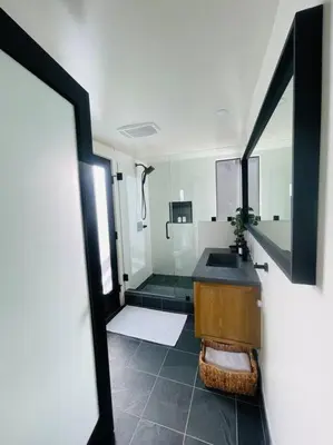 a bathroom with a sink and a shower at Sled-Ski Snow Summit Lakeside Village - Spa - BBQ - Firepit - Loft - Games in Big Bear Lake