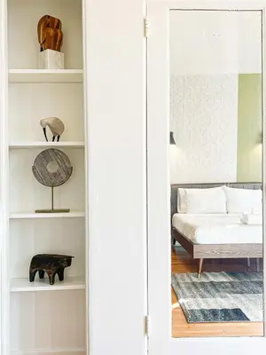 a door leading into a bedroom with a bed at Stylish Residence in Los Angeles - OL-WH in Los Angeles