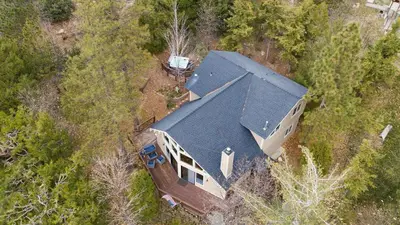 an overhead view of a house with a black roof at North Bay by AvantStay Chic Retreat w Peloton in Blue Jay