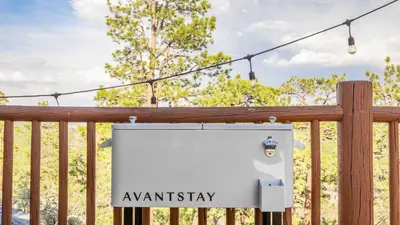 a sign on a wooden fence with the words anaesthesia at Tanglewood by AvantStay 10mins to Bear Mountain Contemporary Hillside Cabin in Big Bear Lake