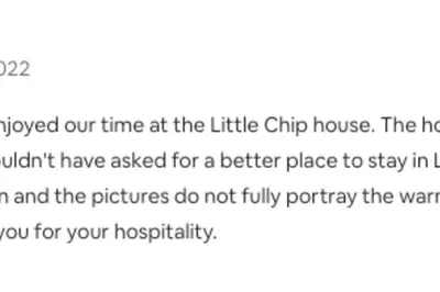 a screenshot of a text message about a chipped house at Little Chip Lake Arrowhead Cabin in Lake Arrowhead