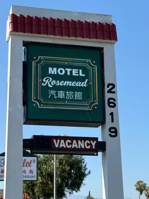 a sign for a motelreserved vacancy at Rosemead Motel in Rosemead