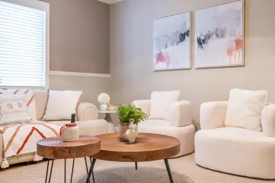 a living room with two chairs and a table at #Marbella Lane - Charming 4BR Bungalo for Relaxing Retreat in Fullerton