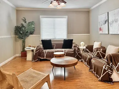 a living room with a couch and a table at #Marbella Lane - Charming 4BR Bungalo for Relaxing Retreat in Fullerton