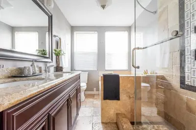 a bathroom with a sink and a shower at Amazing BBQ POOl home at center of LA\u7f8e\u5f0f\u56db\u623f\u5927\u5730\u6cf3\u6c60\u70e7\u70e4\u533a\u7f8e\u5c4b in Chino Hills