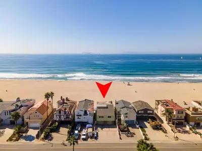 an aerial view of a beach with a red triangle at Beautiful Ocean Front Coastal Sunset Beach House in Oxnard