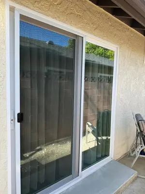 an open sliding glass door to a patio at Romantic Coastal Private Room in Oxnard
