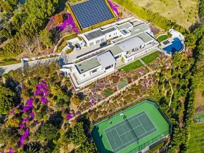 an overhead view of a building with a tennis court at Winding Way in Malibu