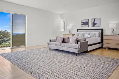 a living room with a couch and a bed at Winding Way in Malibu