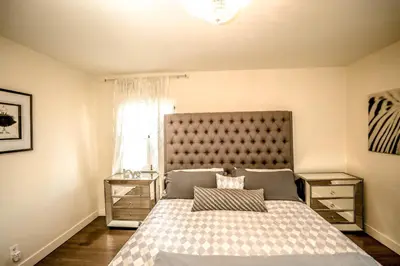 a bedroom with a large bed and a window at Gorgeous Renovated 3BD 2BA near West Hollywood and Beverly Hills in Los Angeles