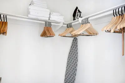 a closet organizer with a tie on a shelf at Hollywood 1BR w Gym Pool Spa nr Sunset LAX-55 in Los Angeles