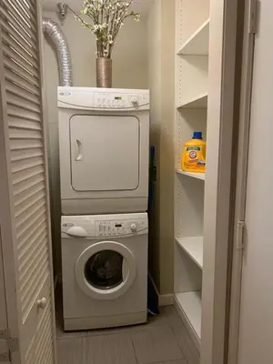 a washer and dryer in a small room at Hollywood loft spectacular free parking in Los Angeles
