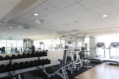 a gym with lots of treadmills and machines at Downtown 1BR w Pool Gym WD nr Staples Center LAX-547 in Los Angeles