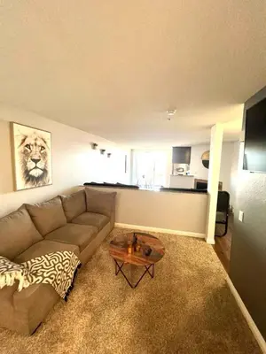 a living room with a couch and a table at Amazing Universal Studios Loft FREE parking in Los Angeles