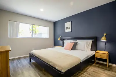 a bedroom with a large bed and a window at W Hollywood 1BR nr Shops Melrose LAX-210 in Los Angeles