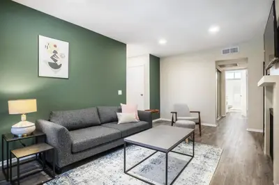 a living room with a couch and a table at W Hollywood 1BR nr Shops Melrose LAX-210 in Los Angeles