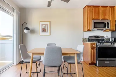 a kitchen with a table and chairs in a room at Marina Del Rey 1BR nr marina shops dining LAX-467 in Los Angeles