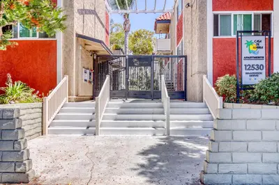 a staircase leading up to a building with a gate at Marina Del Rey 1BR nr marina shops dining LAX-467 in Los Angeles