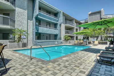 a swimming pool in front of a building at Pasadena 1BR w Gym Pool nr Colorado Ave LAX-862 in Pasadena