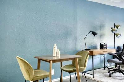 a dining room with a table and chairs at Burbank 1BR w Pool WD Gym nr TJ WF LAX-788 in Los Angeles