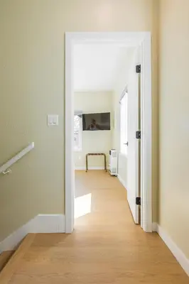 an open door to a hallway in a house at Cozy Sunny Brand-new Apt 1 Block From The Beach in Long Beach