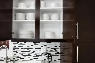 a kitchen with white dishes in a cabinet at North Hollywood 2BR w Gym Pool nr TJ LAX-880 in Los Angeles