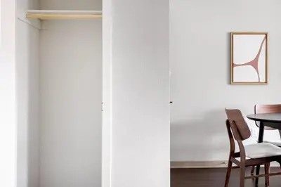 a room with white walls and a table and chairs at North Hollywood 2BR w Gym Pool nr TJ LAX-880 in Los Angeles