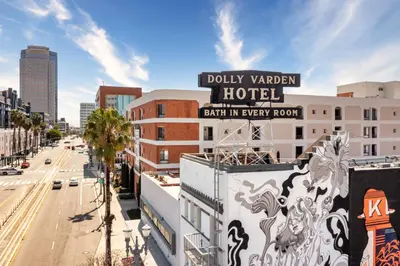 a sign for a hotel on top of a building at The Varden - A Self-Service Micro Hotel in Long Beach